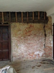 Internal wall stripped back before renovating