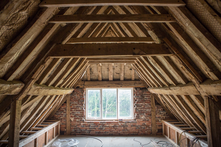 Oak-beamed attic restored by Classic Home Solutions